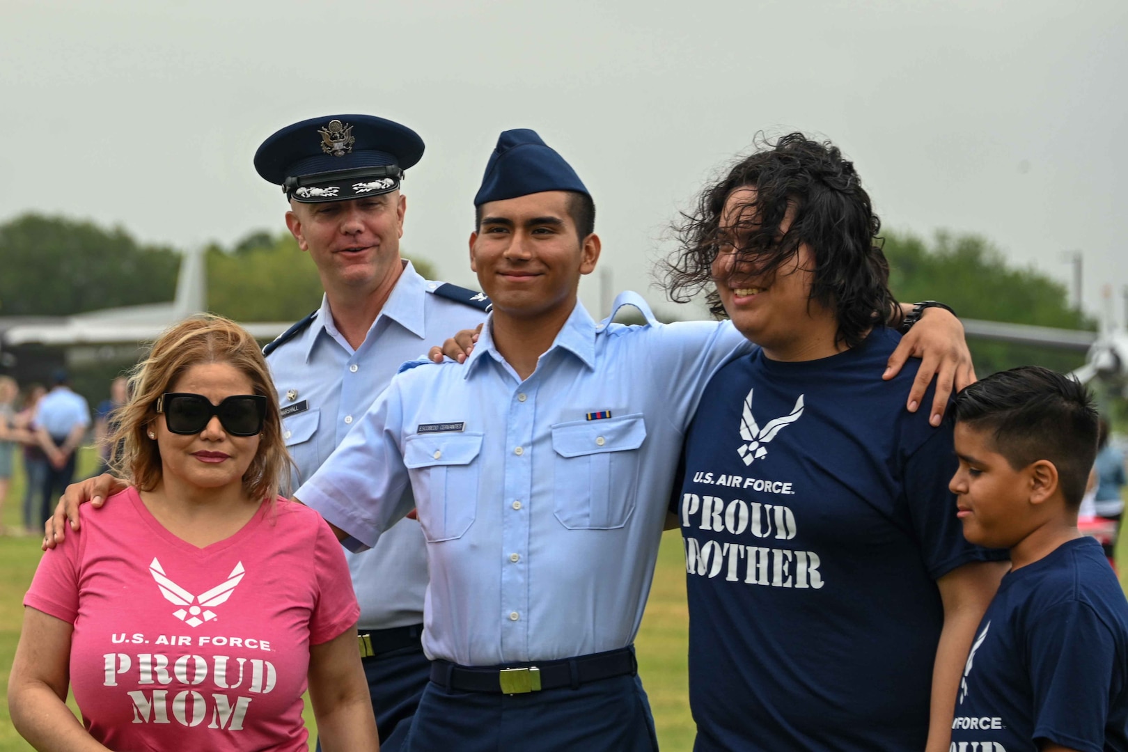 U.S. Air Force Col. Jeff Marshall, 97th Air Mobility Wing commander, congratulates Airman Joshua Omar Escobedo Cervantes, Air Force Basic Military Training graduate, at Joint Base San Antonio-Lackland, Texas, May 16, 2024. Marshall administered the oath of enlistment to the 494 graduating Airmen before they were released to their families. (U.S. Air Force photo by Senior Airman Kari Degraffenreed)