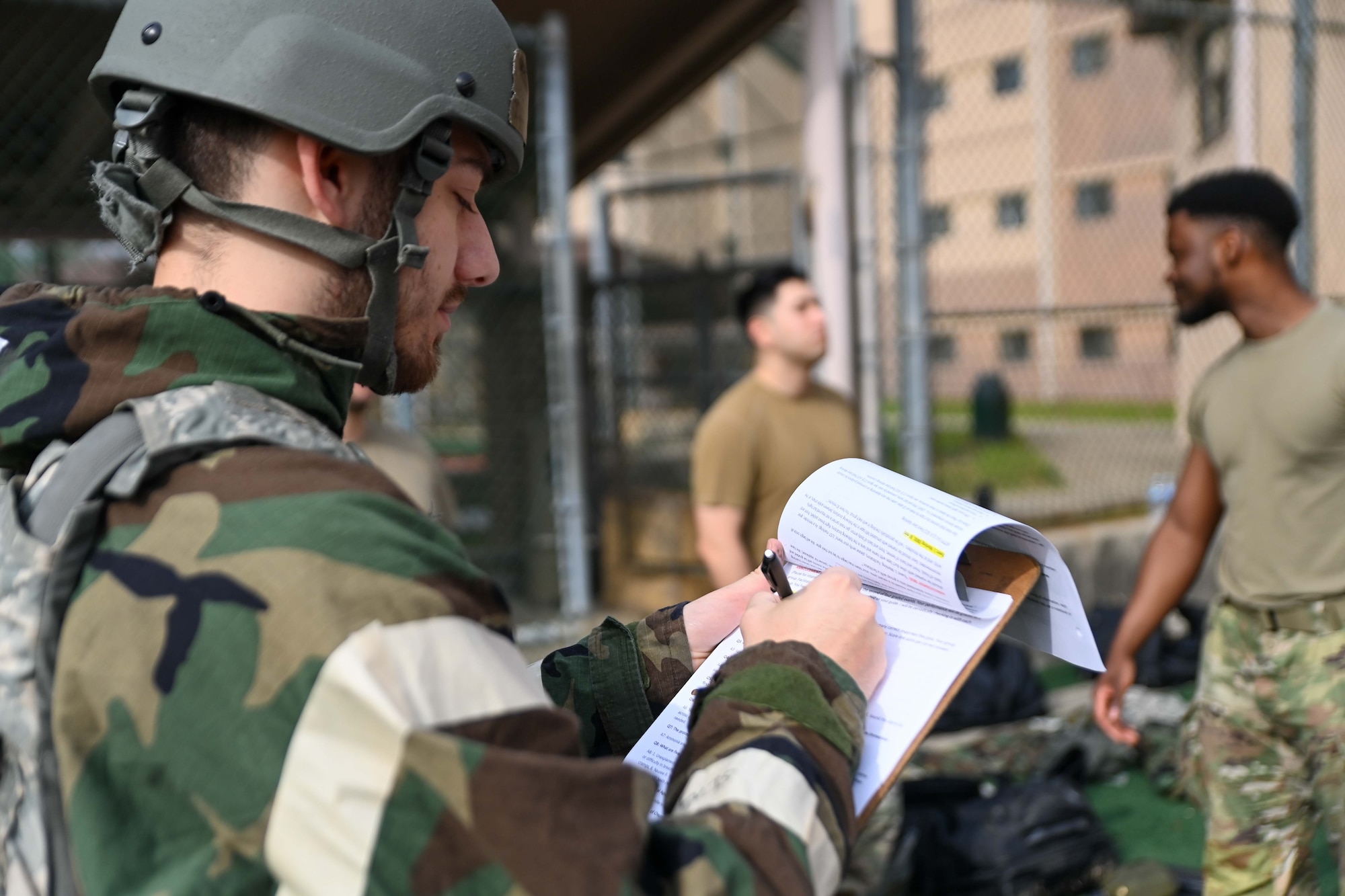 A 694th Intelligence, Surveillance and Reconnaissance Group Airman reviews a checklist during an Ability to Survive and Operate rodeo at Osan Air Base, Republic of Korea, April 26, 2024.