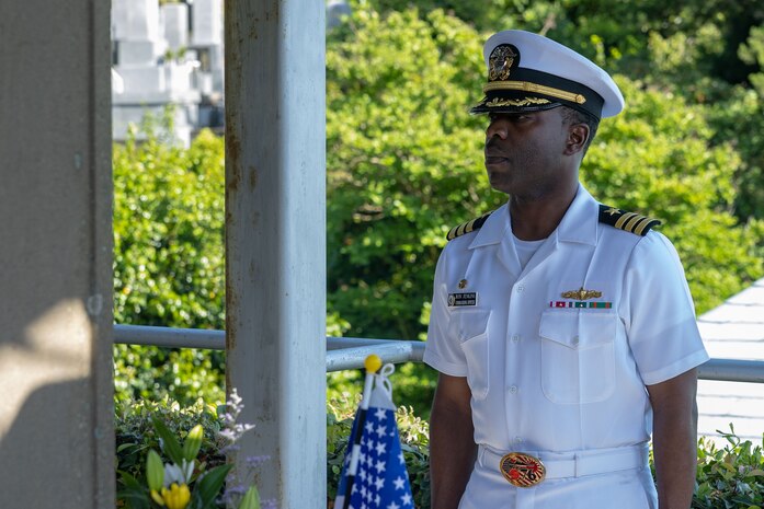 SHIMODA, Japan (May 17, 2024) Cmdr. Ron Jenkins from Columbia, South Carolina, the
commanding officer of the Arleigh Burke-class guided-missile destroyer USS Higgins (DDG 76)
stands at attention during a memorial service at Gyokusenji Temple in Shimoda, Japan, May 17.
The memorial service is part of the 85th Black Ship Festival commemorating the 171st
anniversary of the arrival of Commodore Matthew Perry in Japan in 1853, a historical event that
marked the beginning of diplomacy and trade agreements between the U.S. and Japan. Higgins
is forward deployed and assigned to Destroyer Squadron (DESRON) 15, the Navy’s largest
DESRON and the U.S. 7th fleet’s principal surface force. (U.S. Navy photo by Mass
Communication Specialist 1st Class Hannah Fry)