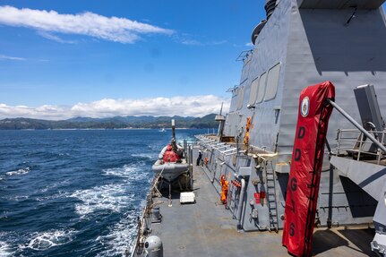 SHIMODA, Japan (May 20, 2024) The Arleigh Burke-class guided-missile destroyer USS Higgins (DDG 76) departs after a scheduled port visit for the 85th Black Ship Festival in Shimoda, Japan, May 20. The Black Ship Festival commemorates the 171st anniversary of the arrival of Commodore Matthew Perry in Japan in 1853, a historical event that marked the beginning of diplomacy and trade agreements between the U.S. and Japan. Higgins is forward deployed and assigned to Destroyer Squadron (DESRON) 15, the Navy’s largest DESRON and the U.S. 7th fleet’s principal surface force.  (U.S. Navy photo by Mass Communication Specialist 1st Class Hannah Fry)