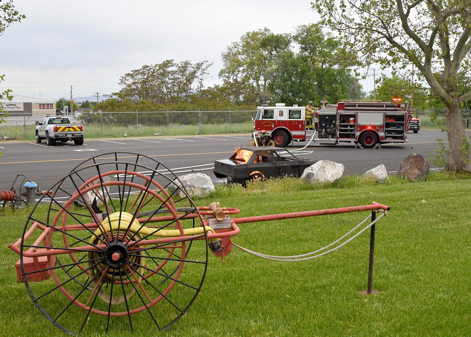 a simulated car fire begins