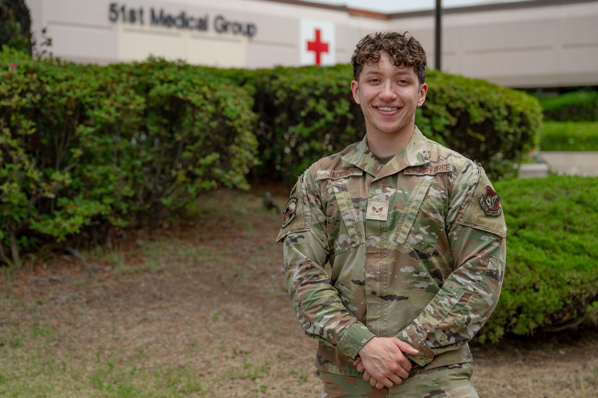 U.S. Air Force Senior Airman Dominick Jackson, 51st Medical Group medical readiness technician, poses for a portrait at Osan Air Base, Republic of Korea, May 21, 2024. Jackson’s dedication and diligence has earned him the title 'Mustang of the Week'. He manages several programs ensuring members of the 51st MDG receive the necessary training and equipment to “Fight Tonight.” (U.S. Air Force photo by Senior Airman Brittany Russell)