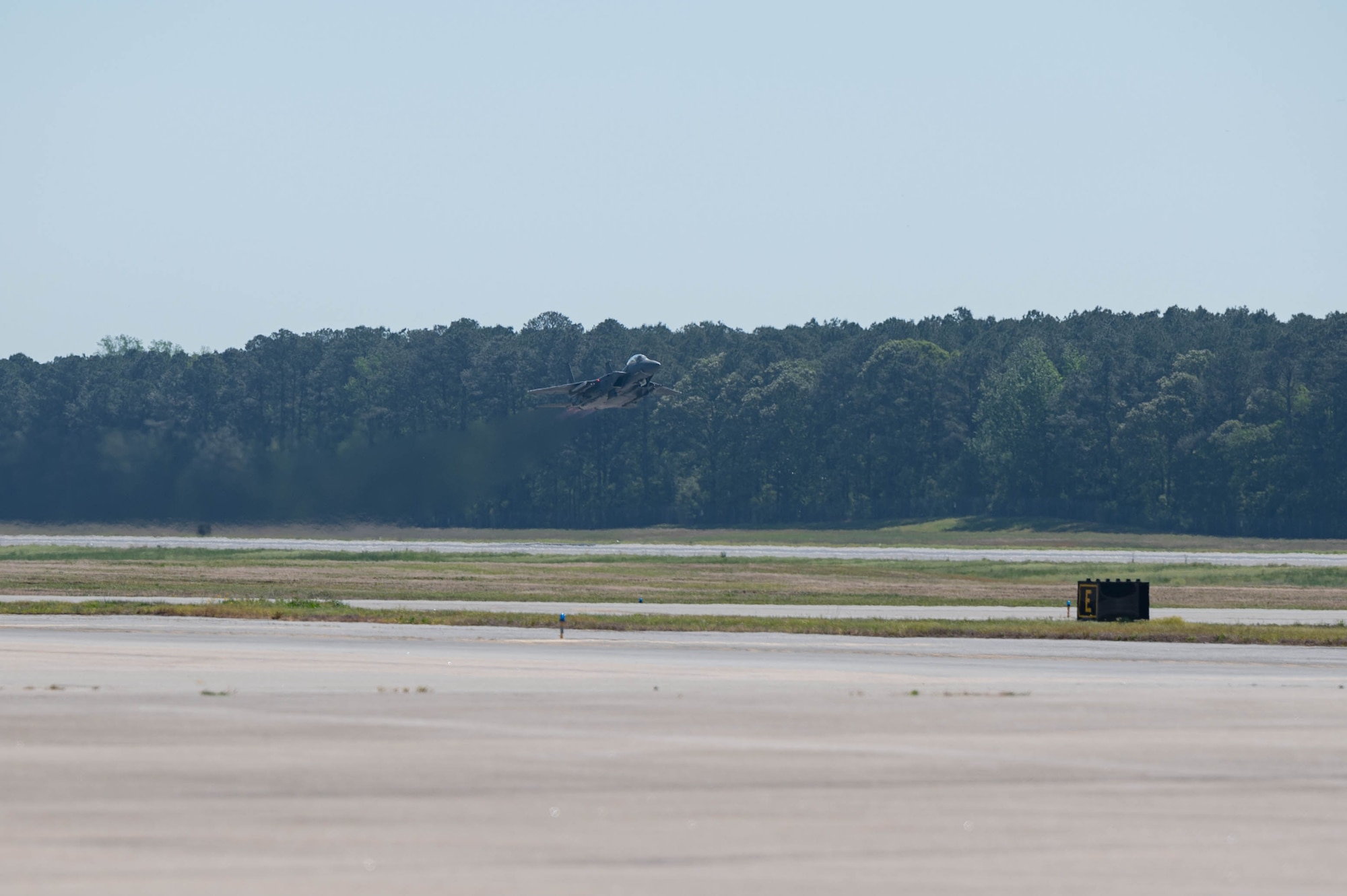 An F-15E Strike Eagle takes off during in-flight testing at Seymour Johnson Air Force Base, North Carolina, April 17, 2024. The Air Force is developing in-flight bladder relief systems to improve the health and safety of female aircrew. (U.S. Air Force photo by Airman 1st Class Rebecca Sirimarco-Lang)