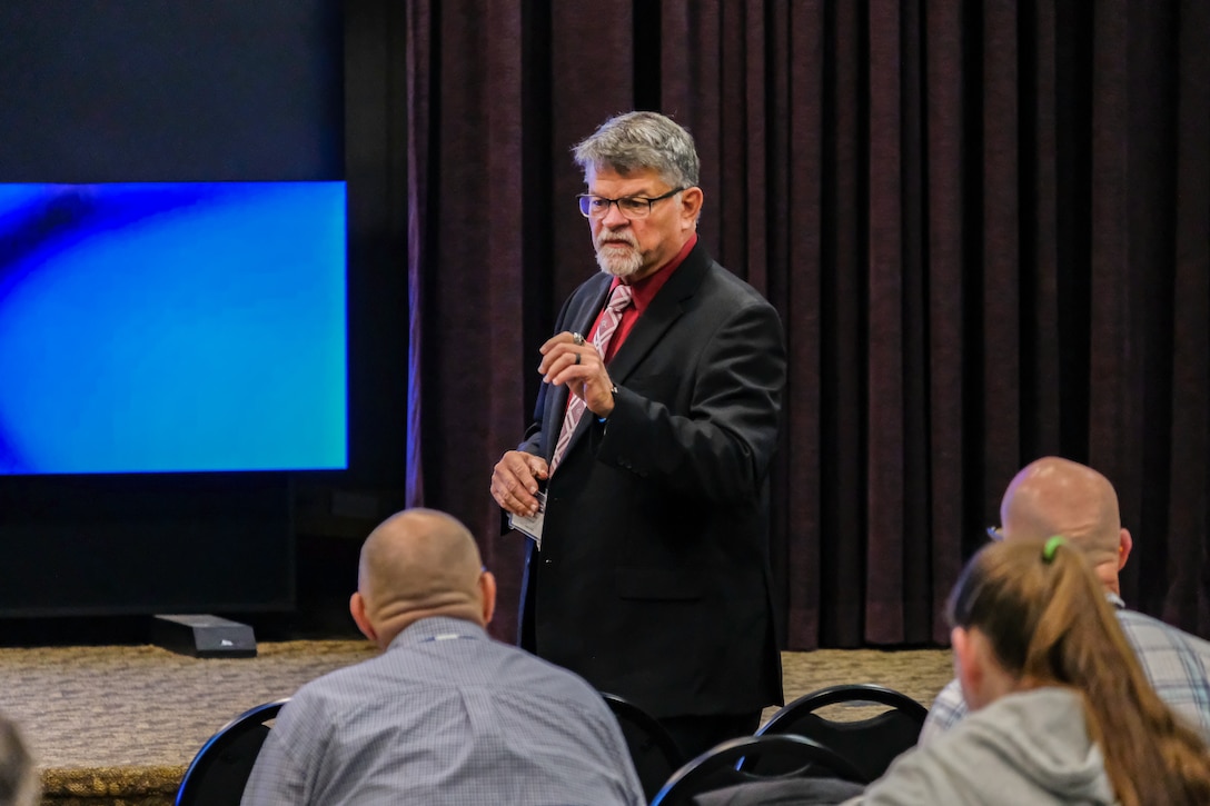 Briefer addresses audience during the HMMS Training.