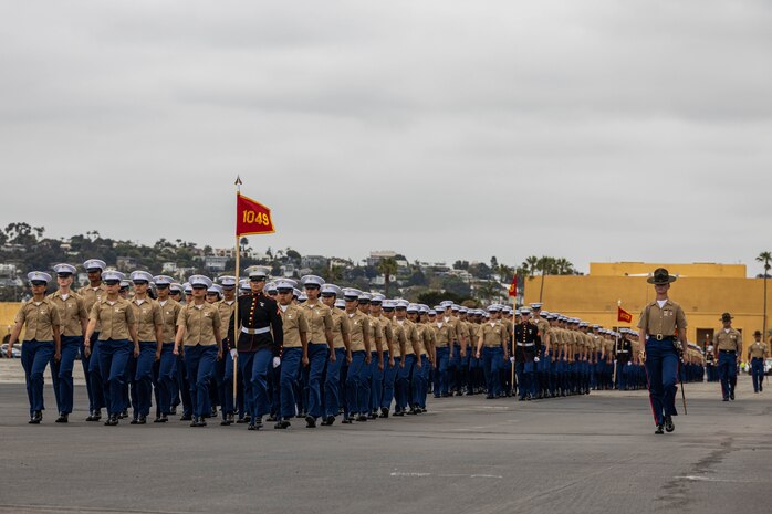 U.S. Marines with Charlie Company, 1st Recruit Training Battalion, march in formation during their graduation ceremony at Marine Corps Recruit Depot San Diego, California, May 17, 2024. Graduation took place at the completion of the 13-week transformation, which included training for drill, marksmanship, basic combat skills, and Marine Corps customs and traditions. (U.S. Marine Corps photo by Cpl. Sarah M. Grawcock)