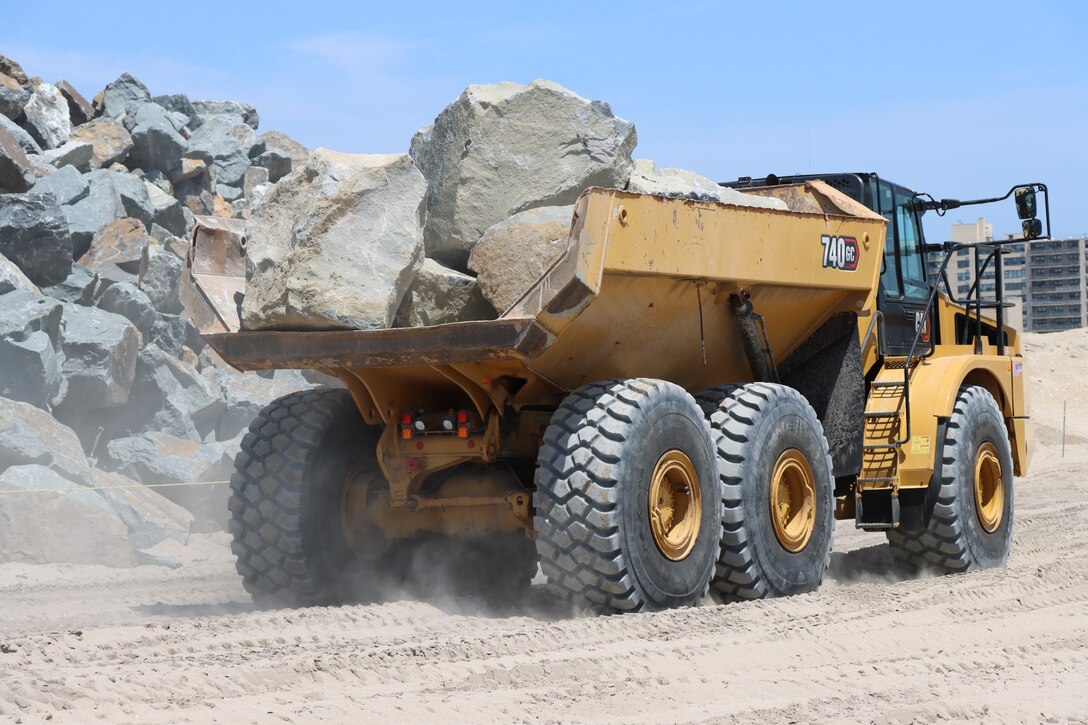 Truck hauls stones in Rockaway