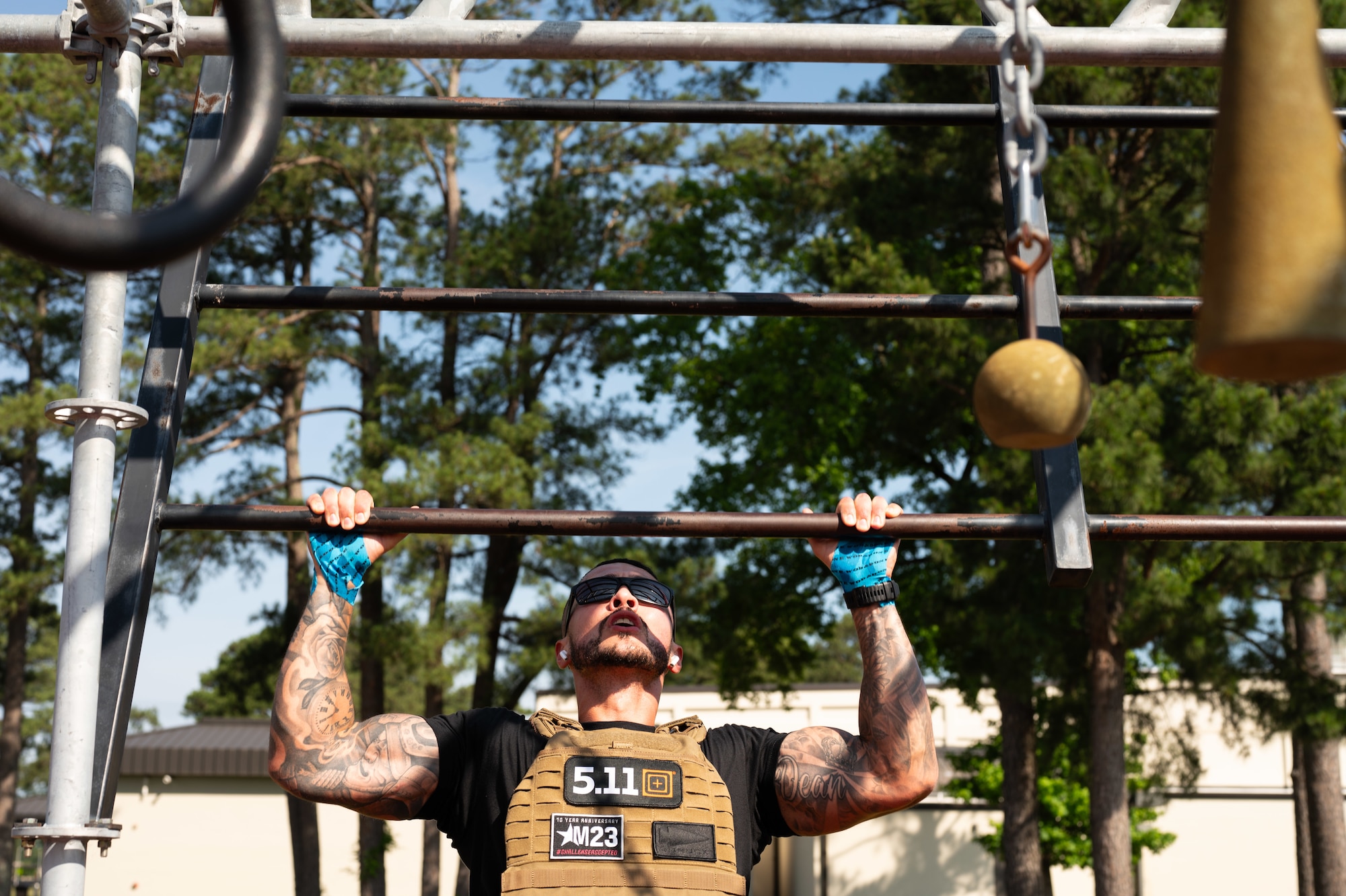 U.S. Air Force Tech Sgt. Dean Robert, 4th Force Support manpower analyst, participates in the annual Murph Challenge at Seymour Johnson Air Force Base, North Carolina, May 17, 2024. The Murph Challenge begins with a one mile run followed by 100 pull-ups, 200 push-ups, 300 air squats and ending with another one mile run. (U.S. Air Force photo by Airman Rebecca Tierney)