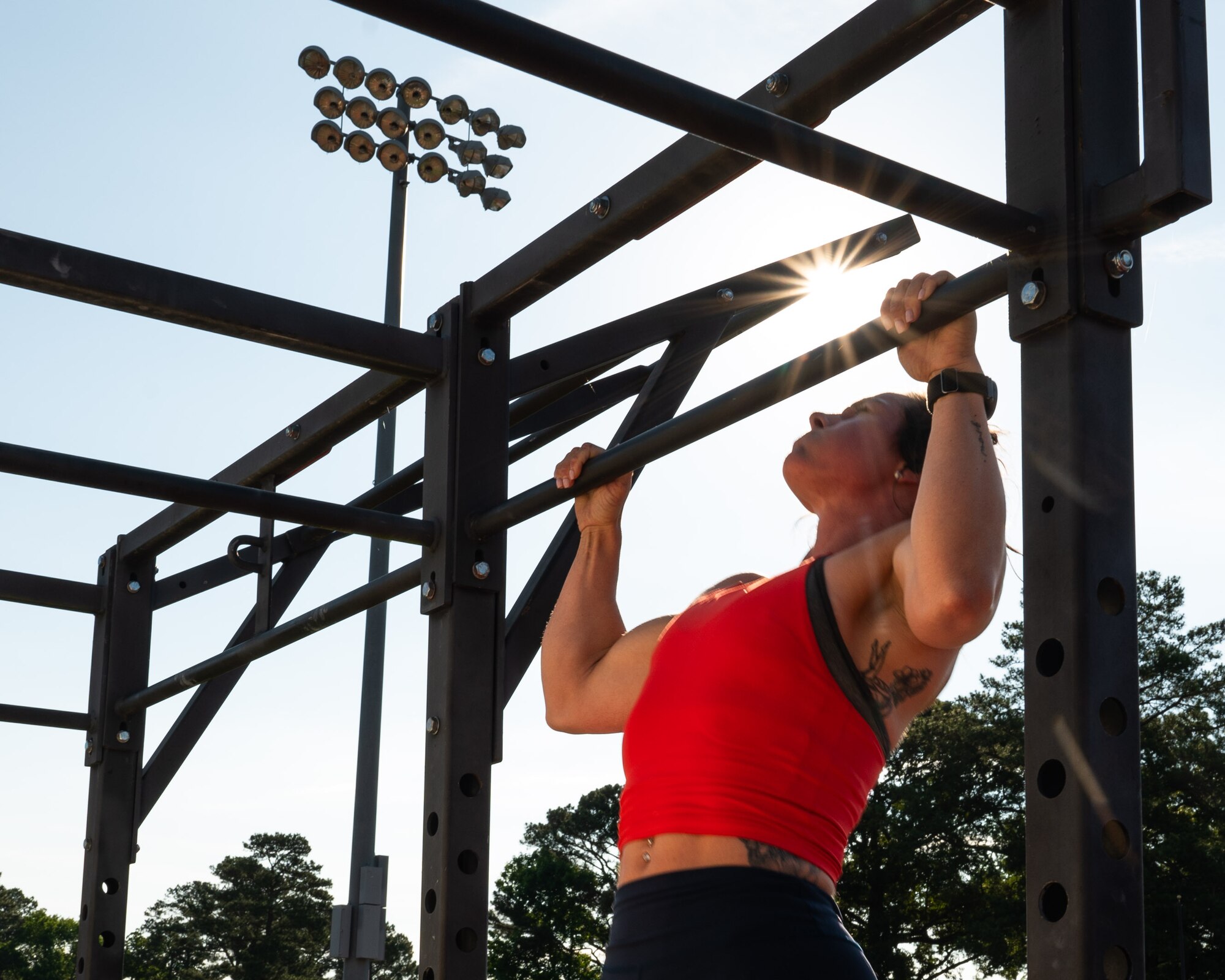 U.S. Air Force Tech Sgt. Stephanie Williams, 4th Force Support Airman Leadership School instructor, participates in the annual Murph Challenge at Seymour Johnson Air Force Base, North Carolina, May 17, 2024. The Murph Challenge begins with a one mile run followed by 100 pull-ups, 200 push-ups, 300 air squats and ending with another one mile run. (U.S. Air Force photo by Airman Rebecca Tierney)