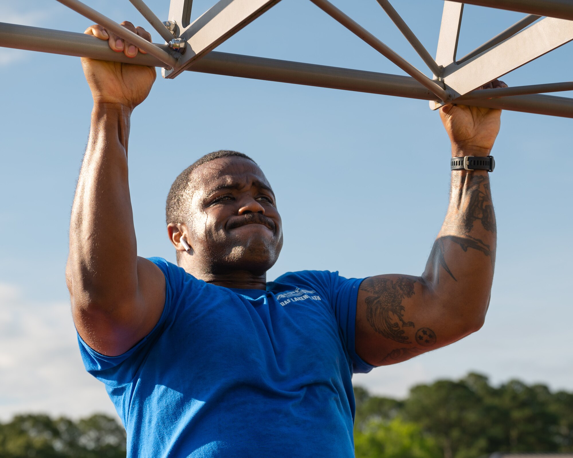 U.S. Air Force Tech Sgt. Malik Williams, 4th Maintenance Group quality assurance inspector, participates in the annual Murph Challenge at Seymour Johnson Air Force Base, North Carolina, May 17, 2024. The Murph Challenge begins with a one mile run followed by 100 pull-ups, 200 push-ups, 300 air squats and ending with another one mile run. (U.S. Air Force photo by Airman Rebecca Tierney)