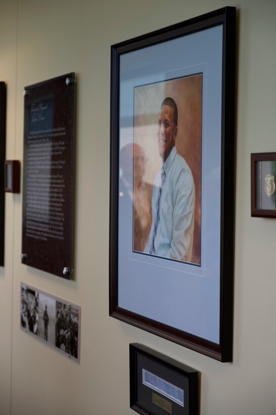 Pearl Mundt, OSI's executive director, meets with Charles Torpy, the agency's first executive director, at OSI's headquarters in Quantico, Virginia.