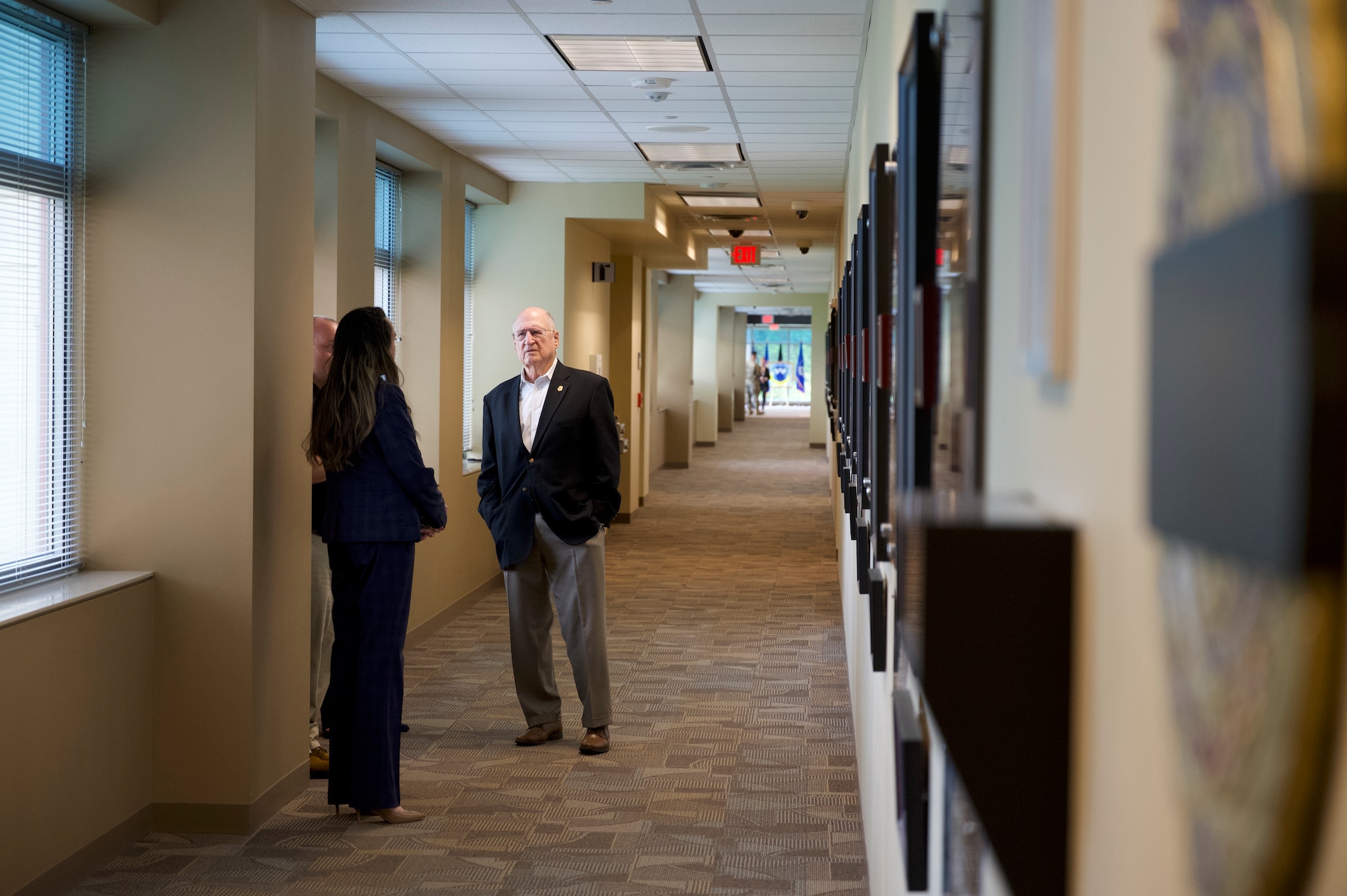 Pearl Mundt, OSI's executive director, meets with Charles Torpy, the agency's first executive director, at OSI's headquarters in Quantico, Virginia.