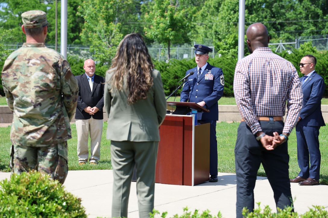 Members of the Office of Special Investigations came together for a flagpole remembrance ceremony at the Russell-Knox Building in Quantico, Virginia, May 20 to honor those who made the ultimate sacrifice while serving. OSI representatives attended the event alongside individuals from the Army Criminal Investigation Division, Naval Criminal Investigative Service and Defense Counterintelligence and Security Agency.