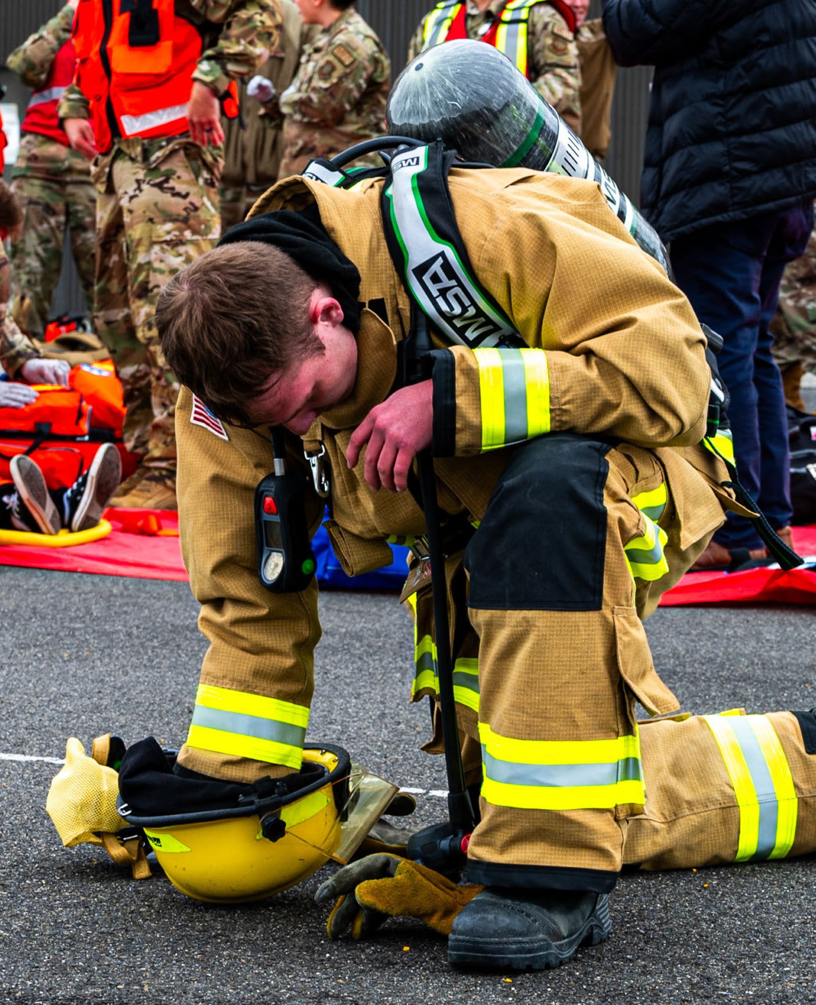 Firefighter kneeling