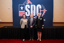 Delaney Burlingame, SSP New Employee Onboarding Workshop program manager (left) poses for a photo with SSP’s Chief Engineer Dr. Steven Van Dyk (SES) (center), and Lt. Cmdr. Kaitlyn Bower (right), SSP deputy branch head for Reentry Systems. The three participated in panels during the Strategic Deterrent Coalition Symposium May 9. They gave voice to the perspectives from the newest members of the nuclear enterprise and spoke on the sense of urgency that is infusing today’s nuclear enterprise workforce.
