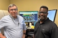 The U.S. Army Reserve 81st RD program team, Dan Thomas and Patrick Green, monitor compliance metrics using dashboards developed for 81st RD environmental programs. The successful development and implementation of a predictive analytics system earned the 81st RD a 2024 Secretary of the Army Environmental Award in the Environmental Quality, Non-Industrial Installation category.