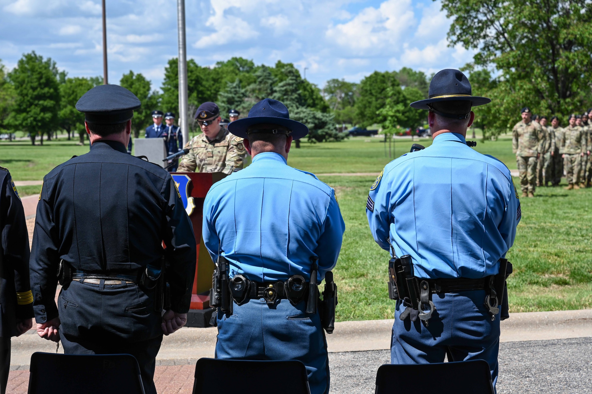 Staff Sgt. Joshua Sage, 22nd Security Forces Squadron patrolman, speaks at the closing ceremony of National Police Week May 17, 2024, at McConnell Air Force Base, Kansas. Police Week is an observance that pays tribute to the local, state and federal officers who have died or been disabled in the line of duty.