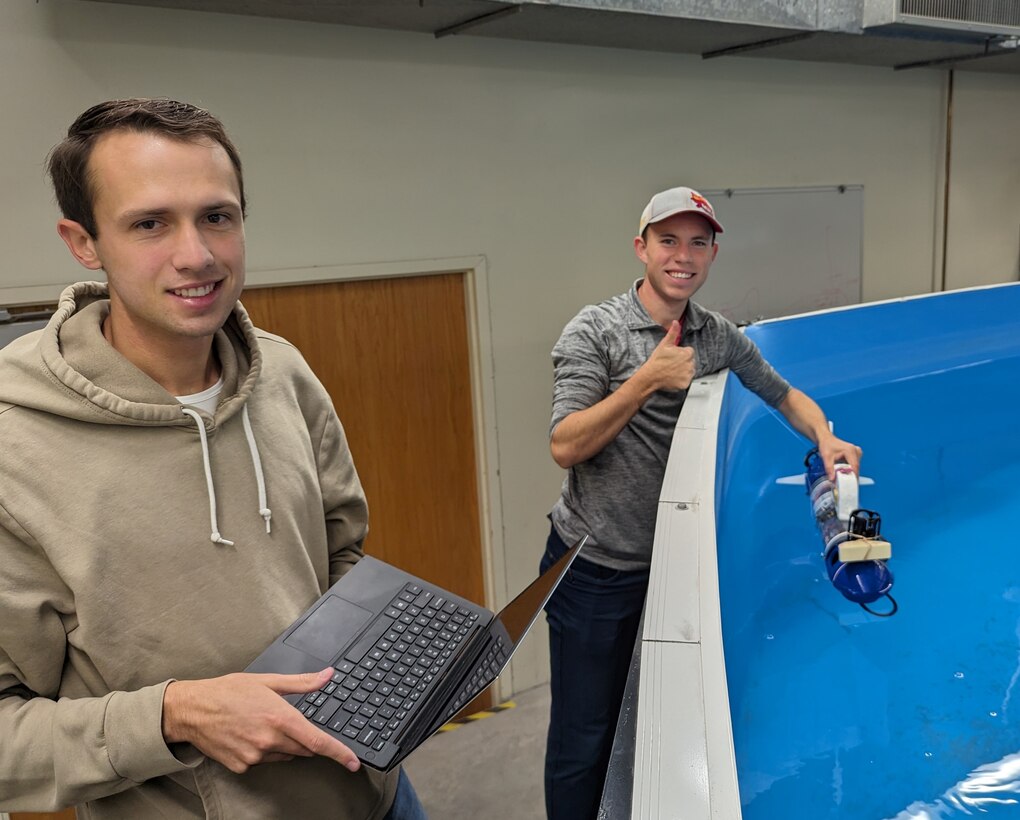 Brigham Young University Naval Engineering Education Consortium (NEEC) students conduct ballast testing of a custom unmanned underwater vehicle (UUV) in preparation for multi-agent testing on this project named: NEEC: Active & Cooperative Terrain Aided Navigation Using Inverted-Ultra-short Baseline. (courtesy photo)