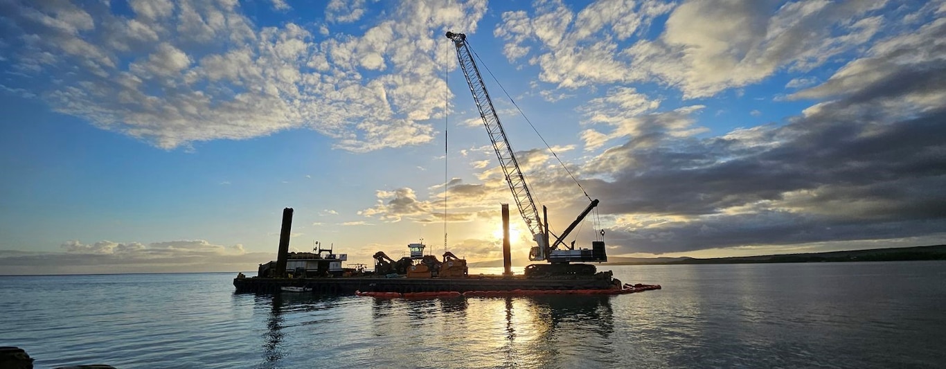 Sunset at Kaunakakai Harbor during the Kaunakakai Harbor dredging project (Photo credit: Ike Borja).