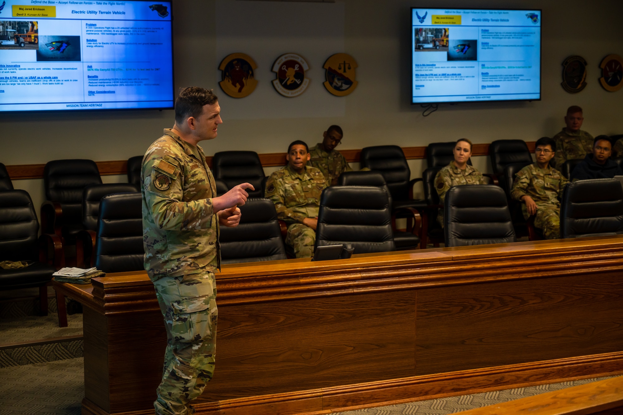 Maj. Jared Erickson, 8th Civil Engineer Squadron operations flight commander, presents his innovative idea during a Wolfwerx event.