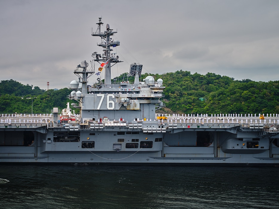 USS Ronald Reagan (CVN 76) Sailors man the rails as the Nimitz-class aircraft carrier departs Commander, Fleet Activities Yokosuka, Japan for the last time May 16, 2024.