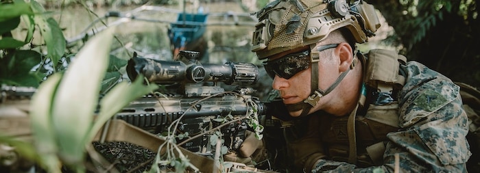 U.S. Marine Corps Lance Cpl. Jonah Hendrickson, a rifleman assigned to Alpha Company, Battalion Landing Team 1/5, 15th Marine Expeditionary Unit, and native of Tennessee, holds security with an M27 Infantry Automatic Rifle during a combined reconnaissance patrol with Philippine Marines.