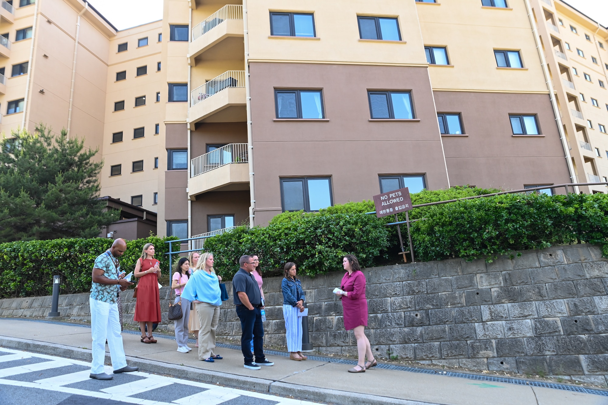 Lori Schneider, and Chris McCool, Pacific Air Forces command team spouses, receive a base housing orientation during a visit to Osan Air Base, Republic of Korea, May 23, 2024.