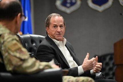 Gen Goldfein speaks to the leaders in a large room.