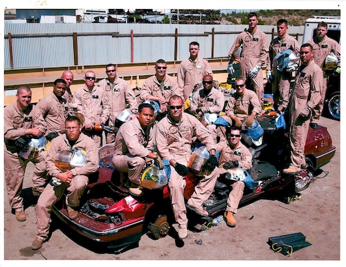 U.S. Marines with the Marine Wing Support Squadron 372 pose for a group picture after a unit training event, Camp Pendleton, California, 2009. Master Gunnery Sgt. Terrail Dickerson, Marine Corps Detachment Goodfellow Air Force Base Fire Company senior enlisted advisor, has taken great pride throughout his career in the individuals he has led and interacted with. (Courtesy photo)