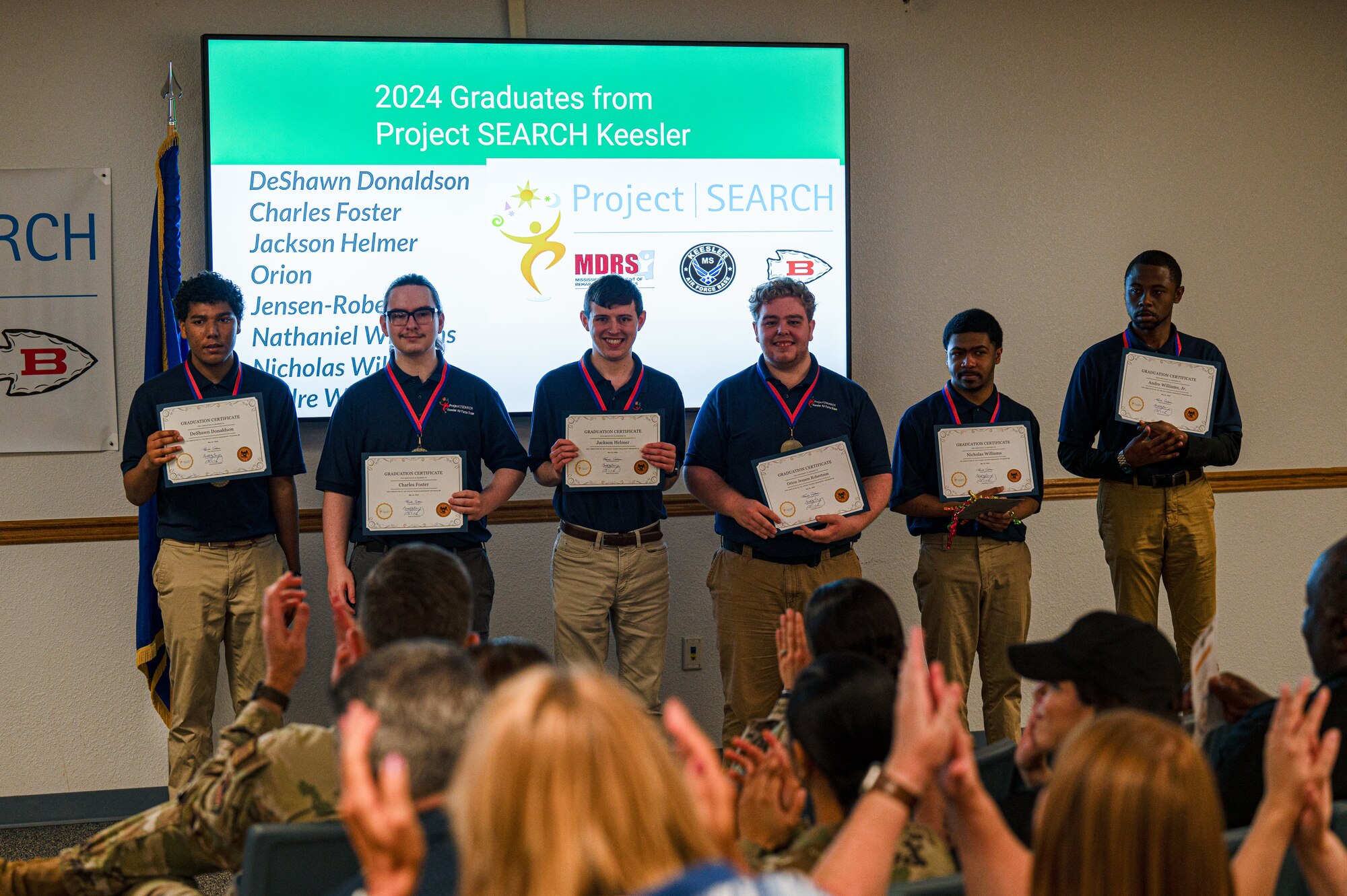 Project SEARCH interns pose with graduation certificates as they are recognized during the Project SEARCH graduation on Keesler Air Force Base, Mississippi, May 21, 2024.