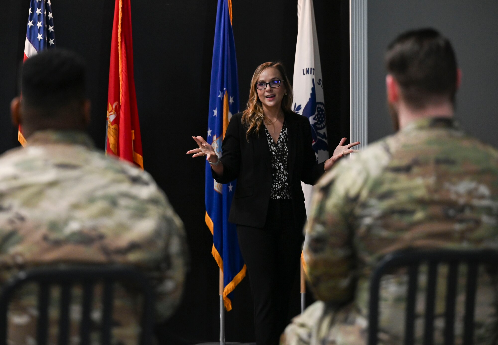 Mari-Ann Isom, Air Education Training Command Adjunct Instructor Program manager, talks to potential Intelligence, Surveillance and Reconnaissance instructors about the purpose of the AETC/A2IP program at the Powell Event Center, Goodfellow Air Force Base, April 29, 2024. The AETC/2AIP is a program geared towards  14N, 1N, 1A8, 9S100 personnel interested in instructing to get a first-hand look at the culture of Goodfellow, the state of training and the city of San Angelo. (U.S. Air Force photo by Airman 1st Class Madison Collier)
