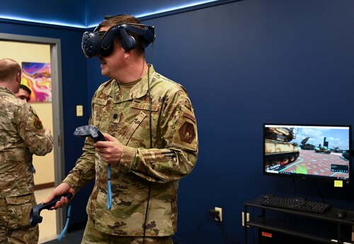 U.S. Air Force Lt. Col. Brad Hyatt, 94th Intelligence Squadron commander, interacts with virtual reality training equipment at the 17th Training Support Squadron’s Instructional Technology Unit during Visit-A-Palooza, Goodfellow Air Force Base, April 30, 2024. Visit-A-Palooza brought 72 leaders from more than 40 units across the ISR enterprise to experience training operations the 17th Training Group has to offer students. (U.S. Air Force photo by Airman 1st Class Madison Collier)