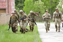 Soldiers attending the combat medic military occupational specialty transition course at the 166th Regiment - Regional Training Institute conduct a mass casualty exercise May 17, 2024, at Fort Indiantown Gap's Combined Arms Collective Training Facility. (U.S. Army National Guard photo by Capt. Angela Clemons)