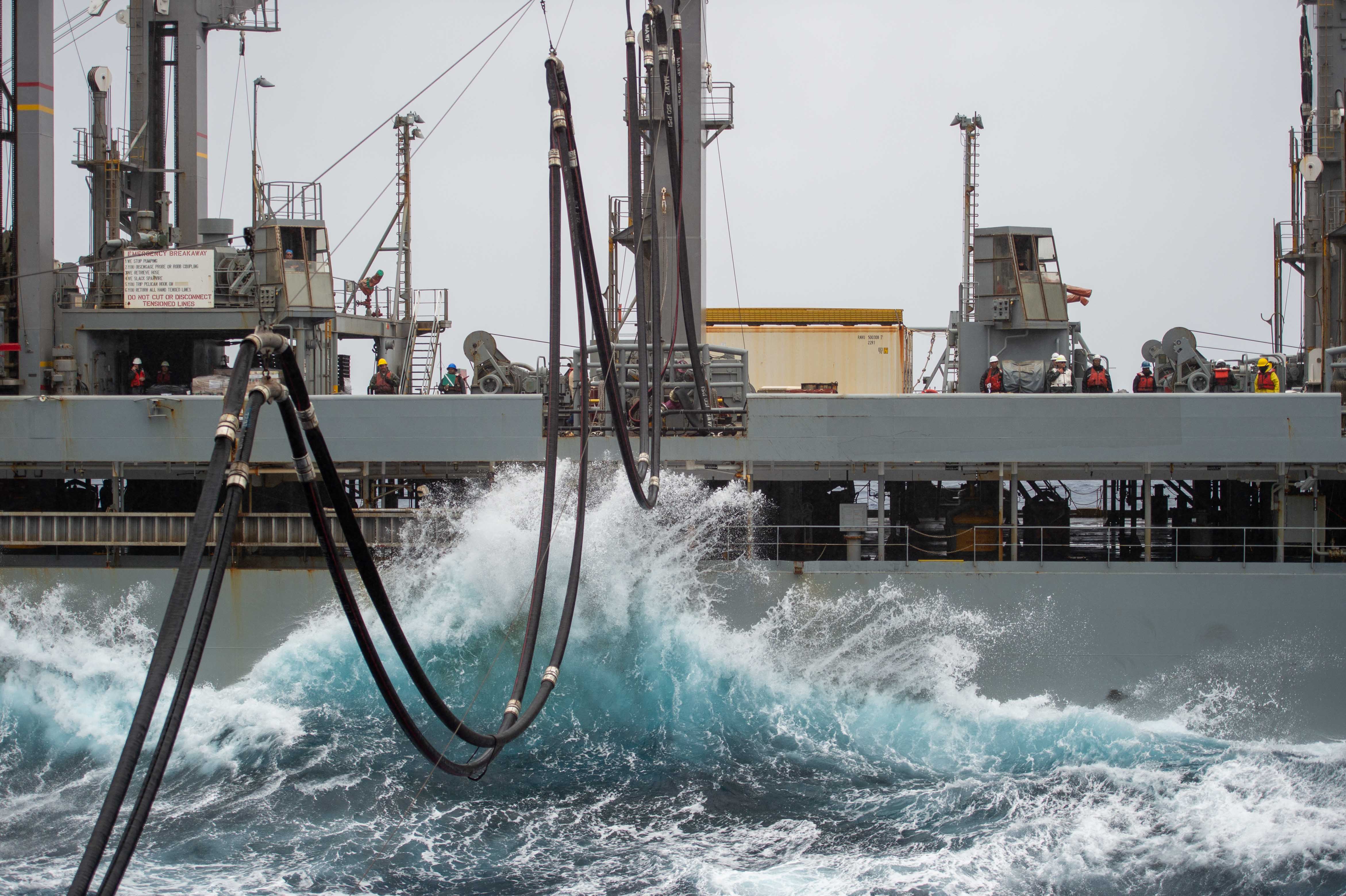 USNS John Ericsson (T-AO 194) steams next to USS Ronald Reagan (CVN 76) during a fueling and replenishment-at-sea.