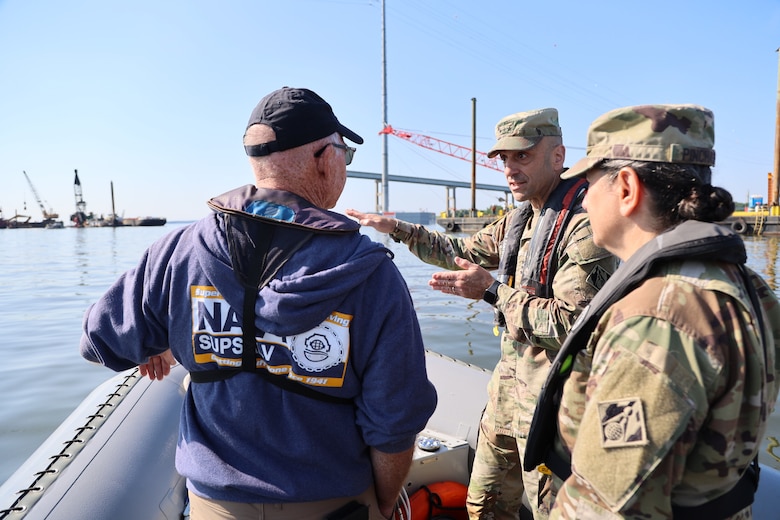 As work continues to fully restore the Fort McHenry Federal Channel, Paul Hankins, director of the Salvage Operations Office of Navy Supervisor of Salvage and Diving, Lt. Gen. Scott Spellmon, commanding general of the U.S. Army Corps of Engineers, and Col. Estee Pinchasin, Baltimore District commander, conduct an onsite assessment May 22, 2024, reviewing what remains of “Section 4” wreckage in Baltimore’s federal navigation channel.  



Unified Command executed the May 13 controlled demolition of Section 4, a 10-million-pound steel truss which had pinned the M/V Dali at the collapsed Francis Scott Key Bridge for nearly seven weeks. Unified Command cleared the federal channel May 20 to an operational width of 400 feet and depth of 50 feet. This allows for the transit of all deep-draft commercial vessels in and out of the Port of Baltimore previously able to move through the federal channel prior to the bridge collapse.