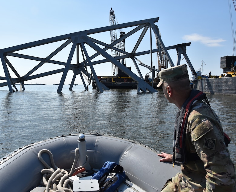 Lt. Gen. Scott A. Spellmon, commanding general of the U.S. Army Corps of Engineers, gets a closer look of what remains of “Section 4” wreckage in the Fort McHenry Federal Channel May 22, 2024.


Unified Command executed the May 13 controlled demolition of Section 4, a 10-million-pound steel truss which had pinned the M/V Dali at the collapsed Francis Scott Key Bridge for nearly seven weeks. Unified Command cleared the federal channel May 20 to an operational width of 400 feet and depth of 50 feet. This allows for the transit of all deep-draft commercial vessels in and out of the Port of Baltimore previously able to move through the federal channel prior to the bridge collapse.