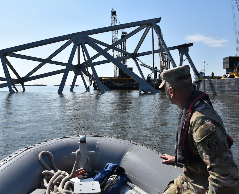 Lt. Gen. Scott A. Spellmon, commanding general of the U.S. Army Corps of Engineers, gets a closer look of what remains of “Section 4” wreckage in the Fort McHenry Federal Channel May 22, 2024.


Unified Command executed the May 13 controlled demolition of Section 4, a 10-million-pound steel truss which had pinned the M/V Dali at the collapsed Francis Scott Key Bridge for nearly seven weeks. Unified Command cleared the federal channel May 20 to an operational width of 400 feet and depth of 50 feet. This allows for the transit of all deep-draft commercial vessels in and out of the Port of Baltimore previously able to move through the federal channel prior to the bridge collapse.