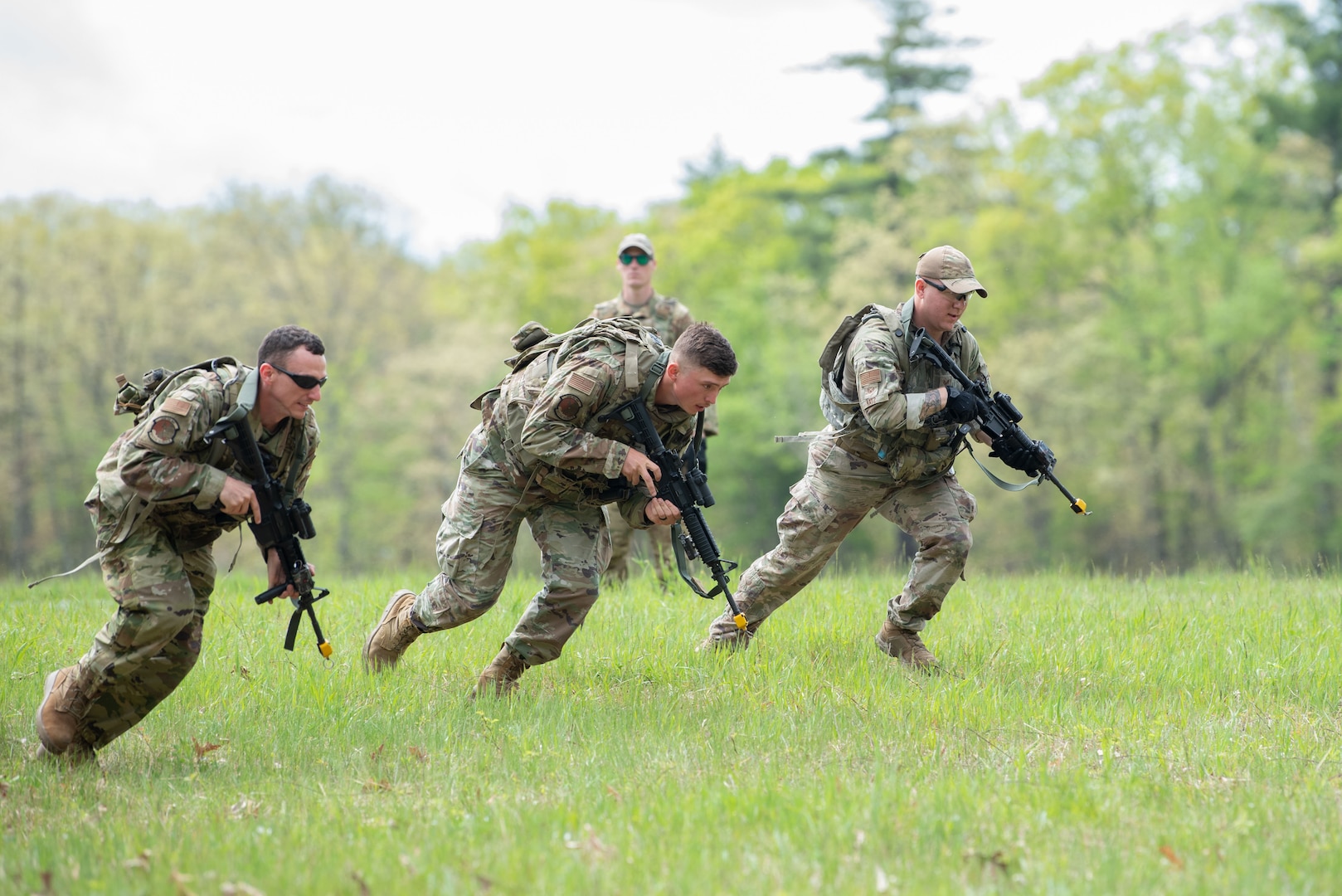 157th Civil Engineer Squadron members practice ground combat team movement skills during the 2024 Region One Prime Base Engineer Emergency Force (BEEF) Field Training Exercise on Fort Devens, Massachusetts, May 15, 2024.