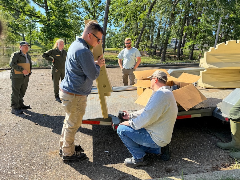 Photos of USACE and Friends of Lake O' the Pines as they build and repair docks at Lake O' the Pines,