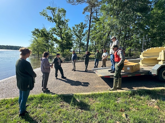 Photos of USACE and Friends of Lake O' the Pines as they build and repair docks at Lake O' the Pines,