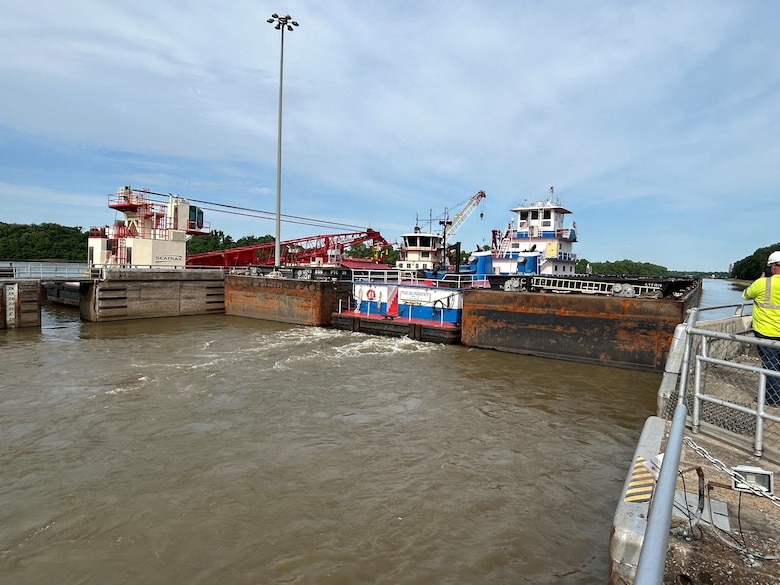 Picture of a barge going through a lock.