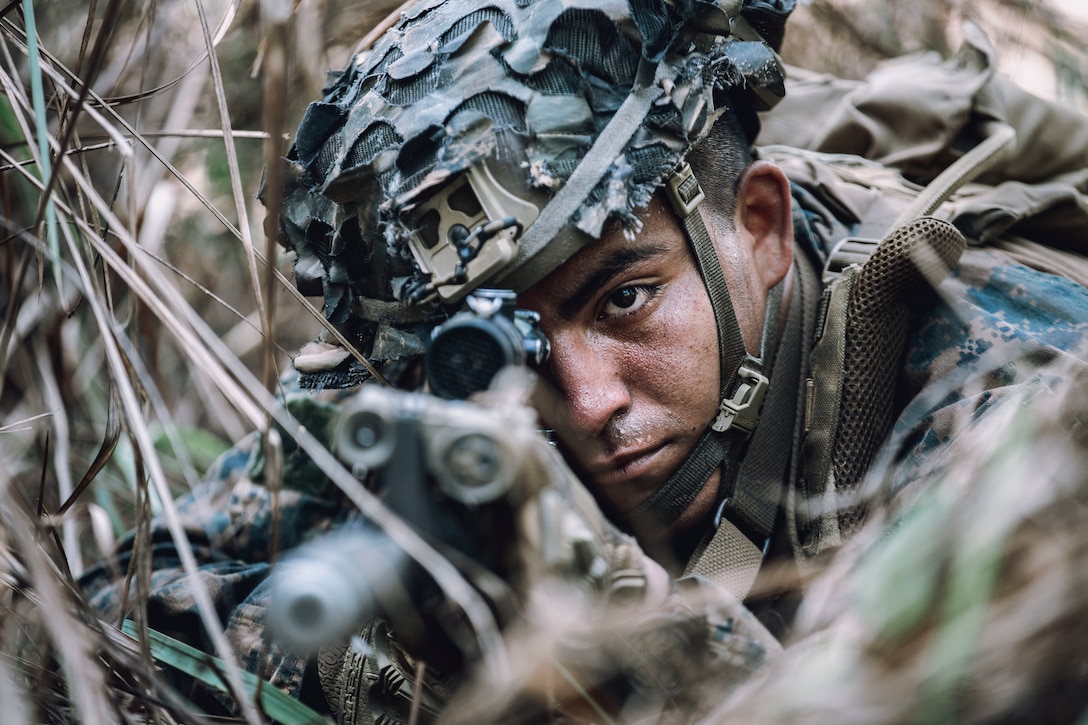 U.S. Marine Corps Lance Cpl. Joseph Arias, a rifleman assigned to Alpha Company, Battalion Landing Team 1/5, 15th Marine Expeditionary Unit, and native of California, holds security with an M4 carbine during a combined reconnaissance patrol with Philippine Marines assigned to the Marine Battalion Landing Team 3 as part of Archipelagic Costal Defense Continuum at San Vicente, Palawan, Philippines, May 21, 2024. ACDC is a series of bilateral exchanges and training opportunities between U.S. Marines and Philippine Marines aimed at bolstering the Philippine Marine Corps’ Coastal Defense strategy while supporting modernization efforts of the Armed Forces of the Philippines.