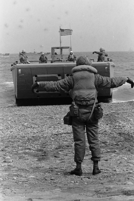 A landing craft comes ashore.