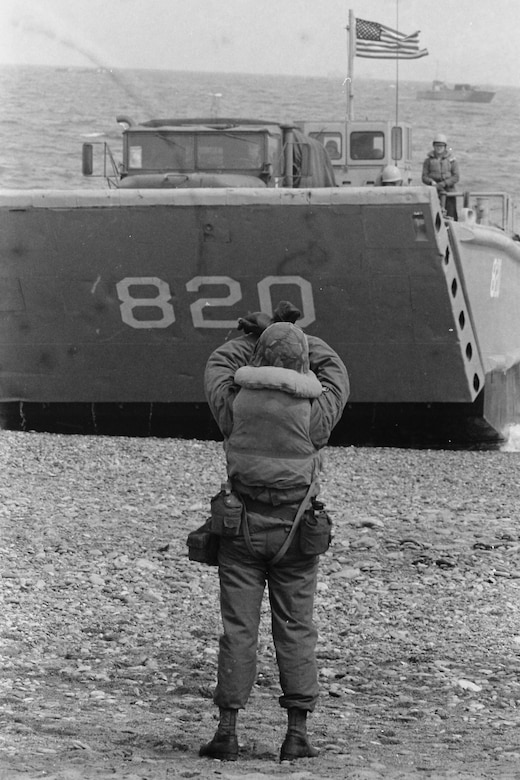 A landing craft comes ashore.