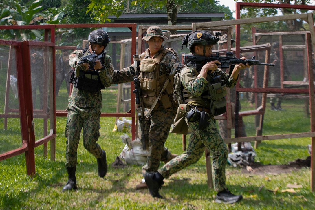 U.S. Marine Corps Lance Cpl. Jason Tamayopacheco, a squad leader with 1st Battalion, 7th Marine Regiment, 1st Marine Division, coaches members of the Philippine National Police during close-quarters battle training for Archipelagic Coastal Defense Continuum in Barira, Philippines, May 20, 2024. ACDC is a series of bilateral exchanges and training opportunities between U.S. Marines and Philippine Marines aimed at bolstering the Philippine Marine Corps’ Coastal Defense strategy while supporting the modernization efforts of the Armed Forces of the Philippines. Tamayopacheco is a native of California. (U.S. Marine Corps photo by Cpl. Kayla Halloran)