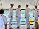 Capt. Rob Kistner takes command of U.S. Coast Guard Forces Micronesia Sector Guam from Capt. Nick Simmons in a change of command ceremony at Victor Pier in Apra Harbor, Guam, on May 23, 2024. Rear Adm. Michael Day, U.S. Coast Guard 14th District commander, presided over the ceremony. Hailing from Tallahassee, Florida, Capt. Simmons leaves Guam to rejoin the staff at U.S. Coast Guard Headquarters as the chief of the Office of Budget and Programs (CG-82). Capt. Rob Kistner, a native of Rochester, New York, joins the Forces Micronesia team after serving as the chief of Prevention for the U.S. Coast Guard 14th District. (U.S. Coast Guard photo by Chief Warrant Officer Sara Muir)