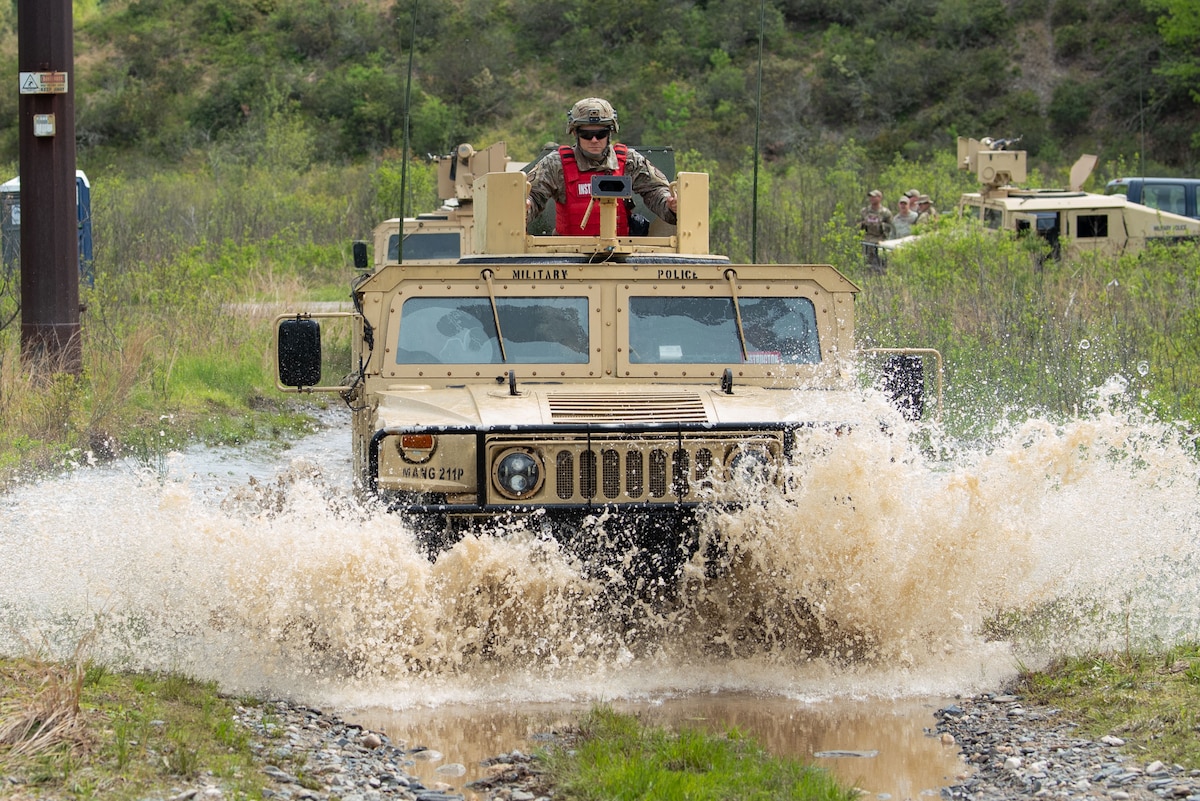 An instructor leads Air National Guardsmen from five civil engineer squadrons in combat vehicle operation training during the 2024 Region One Prime Base Engineer Emergency Force (BEEF) Field Training Exercise on Fort Devens, Massachusetts, May 15, 2024.
