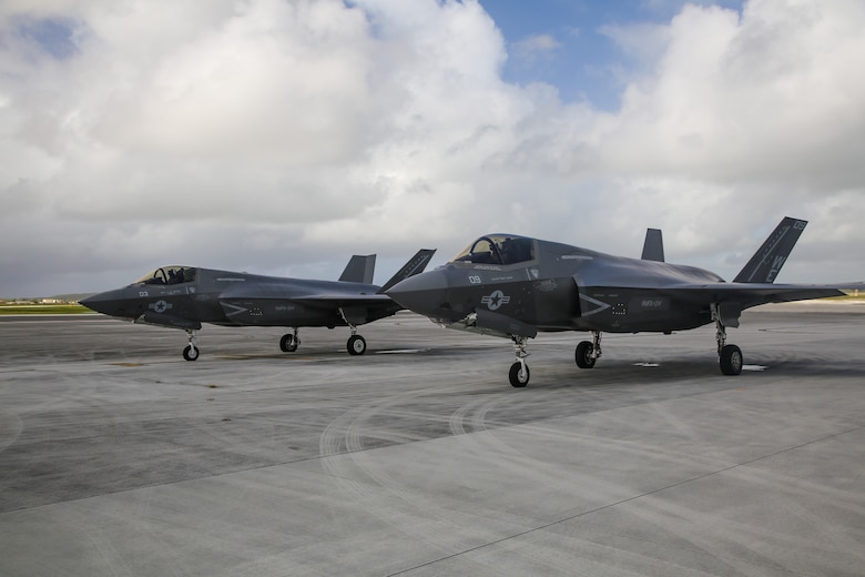 U.S. Marine Corps Maj. John-Paul Reyes, an F-35B Lightning II pilot, with Marine Fighter Attack Squadron (VMFA) 214, Marine Aircraft Group 13, 3rd Marine Aircraft Wing, straps into the seat of an F-35B Lighting II before a transpacific flight from Camp Blaz, Guam, to Royal Australian Air Force Base Tindal, Australia, May 19, 2024.  VMFA-214 deployed more than 200 Marines and eight F-35B Lightning II aircraft from Marine Corps Air Station Yuma, Arizona, to RAAF Base Tindal, Australia, to conduct bilateral training with the RAAF No. 3 Squadron and No. 75 Squadron. As part of I Marine Expeditionary Force, 3rd MAW persistently trains in the Indo-Pacific, maintaining a forward presence and enduring commitment to our allies and partners in the region. (U.S. Marine Corps photo by Cpl. Nicholas Johnson)