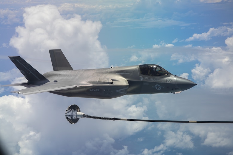 A U.S. Marine Corps F-35B Lightning II aircraft with Marine Fighter Attack Squadron (VMFA) 214, Marine Aircraft Group 13, 3rd Marine Aircraft Wing, maneuvers to receive fuel from a KC-30A Multi-Role Tanker Transport aircraft with No. 33 Squadron, Royal Australian Air Force, over the Pacific Ocean, while flying from Camp Blaz, Guam, to RAAF Base Tindal, Australia, May 19, 2024.  VMFA-214 deployed more than 200 Marines and eight F-35B Lightning II aircraft from Marine Corps Air Station Yuma, Arizona, to RAAF Base Tindal, Australia, to conduct bilateral training with the RAAF No. 3 Squadron and No. 75 Squadron. As part of I Marine Expeditionary Force, 3rd MAW persistently trains in the Indo-Pacific, maintaining a forward presence and enduring commitment to our allies and partners in the region. (U.S. Marine Corps photo by Cpl. Nicholas Johnson)