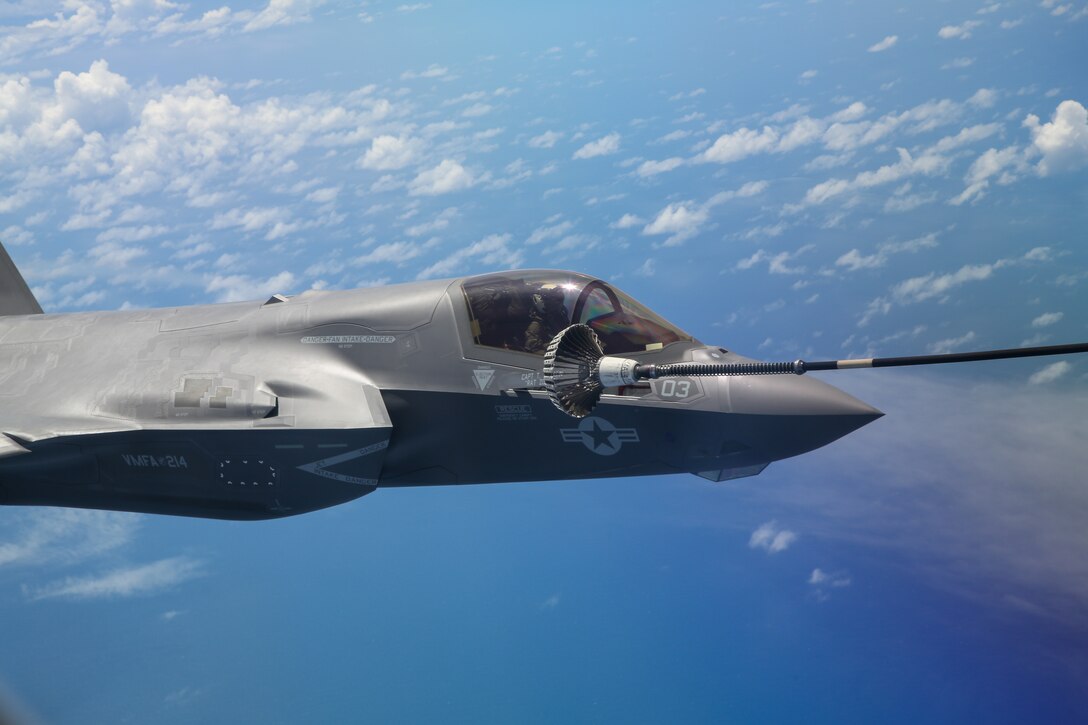 A U.S. Marine Corps F-35B Lightning II aircraft with Marine Fighter Attack Squadron (VMFA) 214, Marine Aircraft Group 13, 3rd Marine Aircraft Wing, receives fuel from a KC-30A Multi-Role Tanker Transport aircraft with No. 33 Squadron, Royal Australian Air Force, over the Pacific Ocean, while flying from Camp Blaz, Guam, to RAAF Base Tindal, Australia, May 19, 2024.  VMFA-214 deployed more than 200 Marines and eight F-35B Lightning II aircraft from Marine Corps Air Station Yuma, Arizona, to RAAF Base Tindal, Australia, to conduct bilateral training with the RAAF No. 3 Squadron and No. 75 Squadron. As part of I Marine Expeditionary Force, 3rd MAW persistently trains in the Indo-Pacific, maintaining a forward presence and enduring commitment to our allies and partners in the region. (U.S. Marine Corps photo by Cpl. Nicholas Johnson)