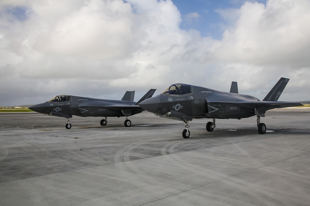 U.S. Marine Corps Maj. John-Paul Reyes, an F-35B Lightning II pilot, with Marine Fighter Attack Squadron (VMFA) 214, Marine Aircraft Group 13, 3rd Marine Aircraft Wing, straps into the seat of an F-35B Lighting II before a transpacific flight from Camp Blaz, Guam, to Royal Australian Air Force Base Tindal, Australia, May 19, 2024.  VMFA-214 deployed more than 200 Marines and eight F-35B Lightning II aircraft from Marine Corps Air Station Yuma, Arizona, to RAAF Base Tindal, Australia, to conduct bilateral training with the RAAF No. 3 Squadron and No. 75 Squadron. As part of I Marine Expeditionary Force, 3rd MAW persistently trains in the Indo-Pacific, maintaining a forward presence and enduring commitment to our allies and partners in the region. (U.S. Marine Corps photo by Cpl. Nicholas Johnson)